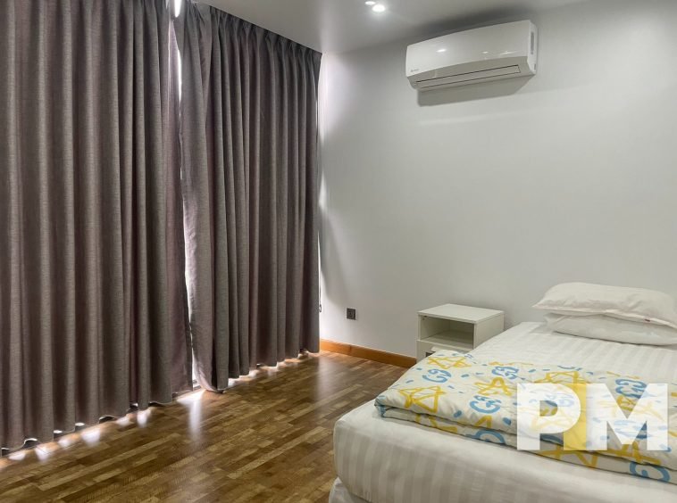 bedroom with air conditioner - Myanmar Condo for rent