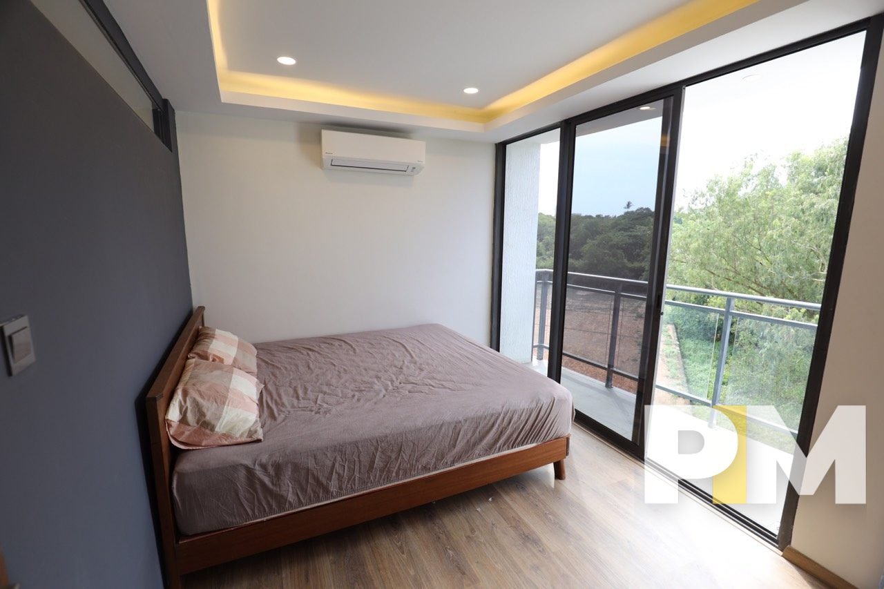 bedroom with balcony - properties in Yangon