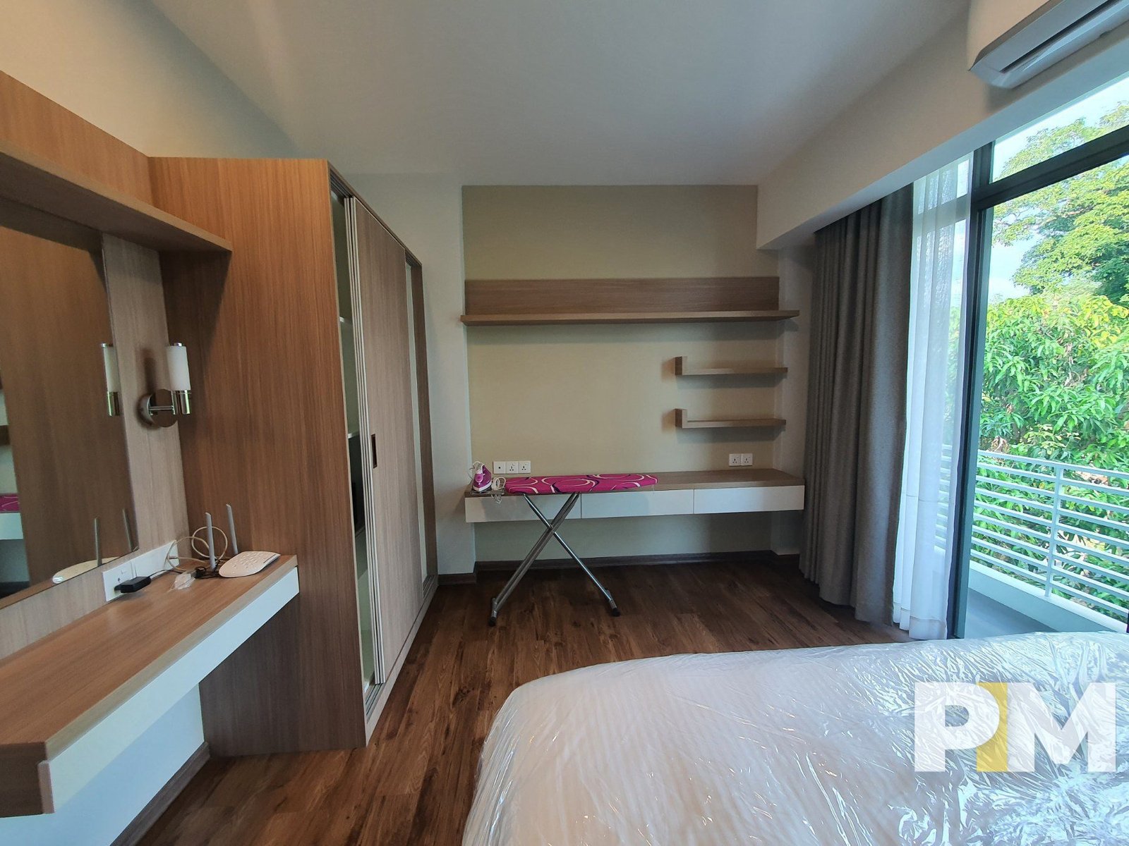 bedroom with balcony - properties in Yangon