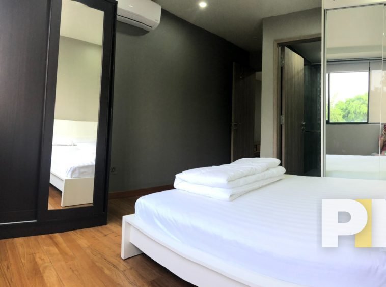 bedroom with bed and mattress - Myanmar Property