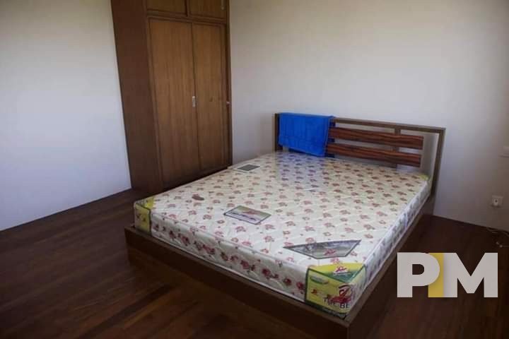 bedroom with bed and mattress - Rent in Myanmar