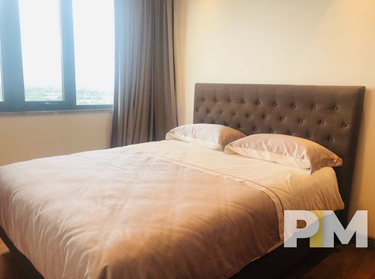 bedroom with bed and mattress - Yangon Real Estate