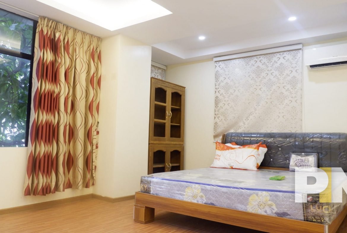 bedroom with bed and mattress - Yangon Real Estate