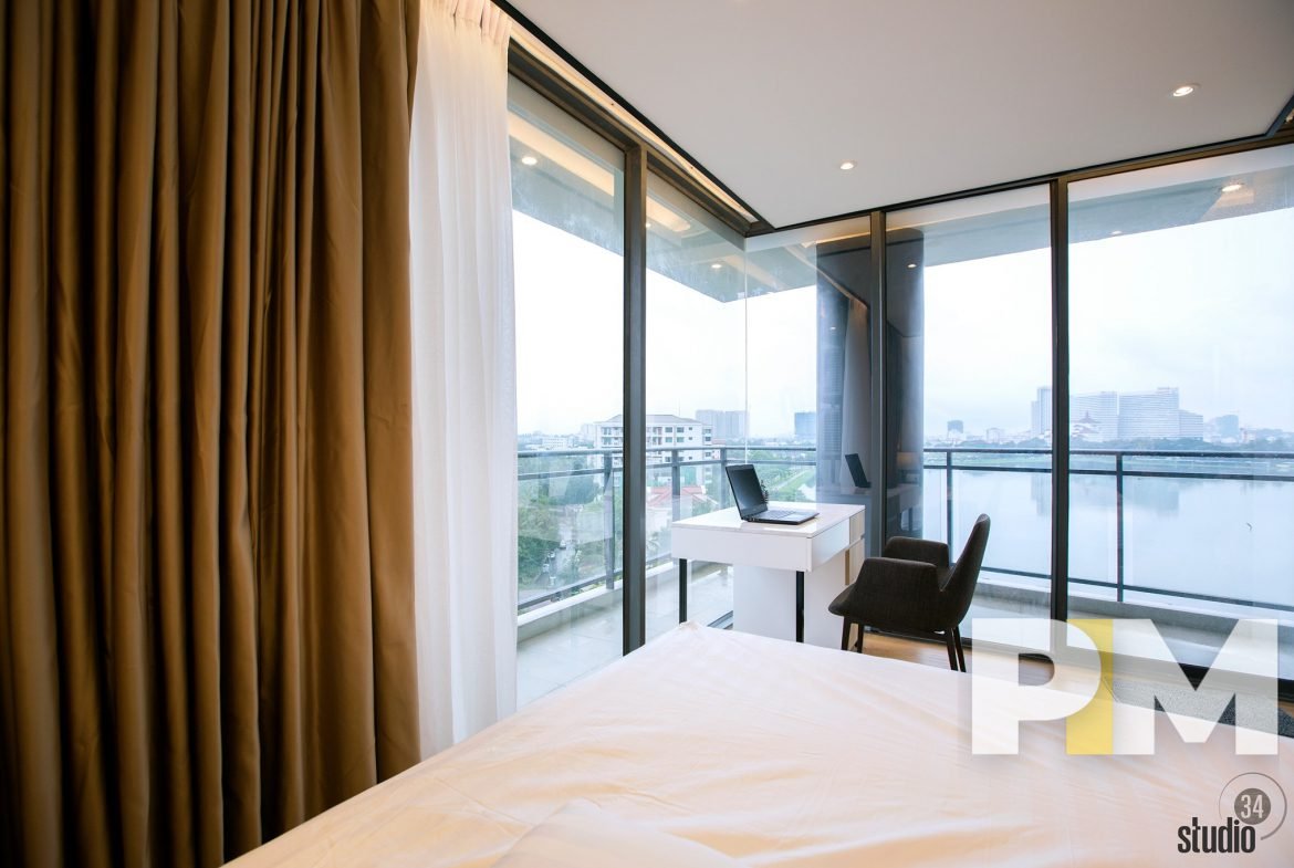 bedroom with bedside desk - Yangon Real Estate