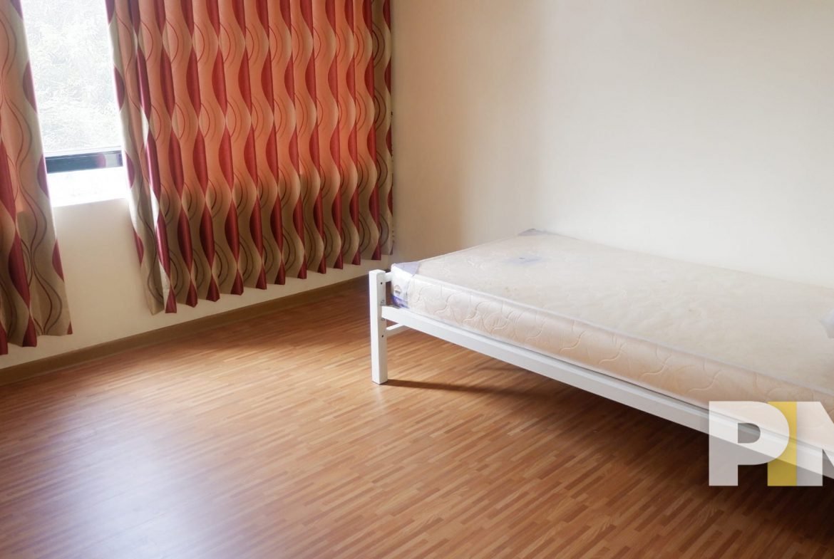 bedroom with curtains - Myanmar Property