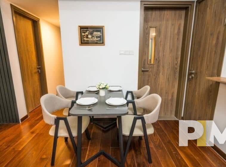 dining room with table and chairs - Real Estate in Yangon