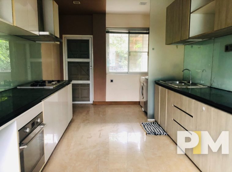 kitchen with cabinets - Home Rental Myanmar