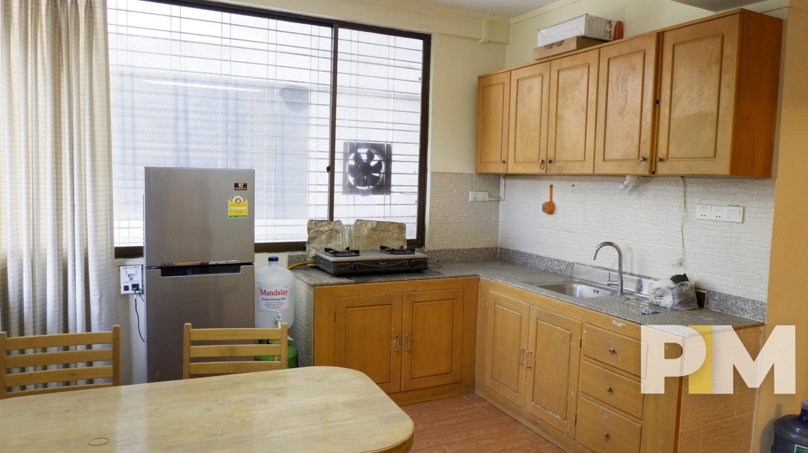 kitchen with cabinets - Home Rental Myanmar