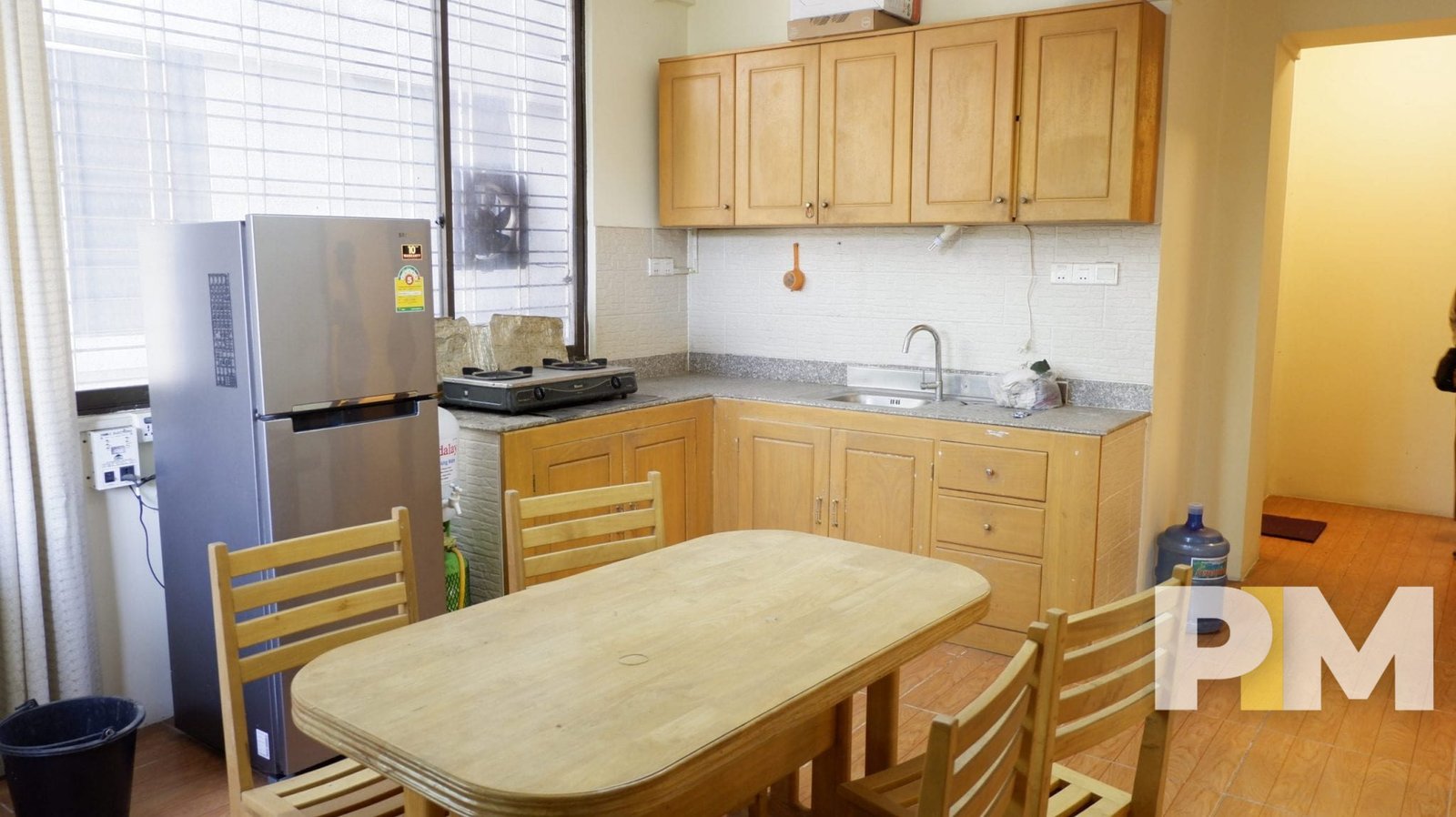 kitchen with dining table and chairs - properties in Yangon