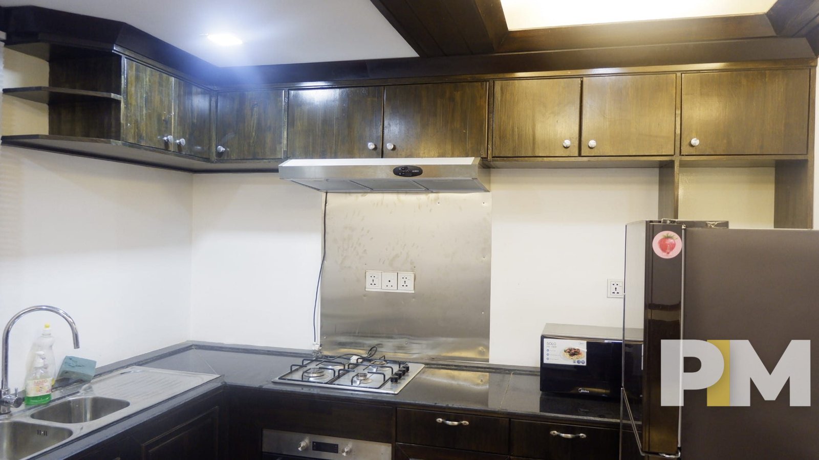 kitchen with stove - Myanmar Property