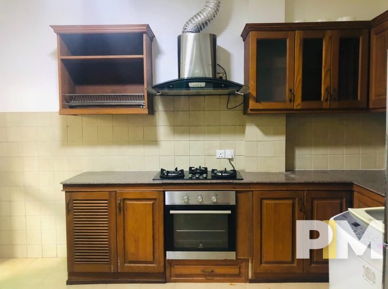 kitchen with stove - Rent in Yangon