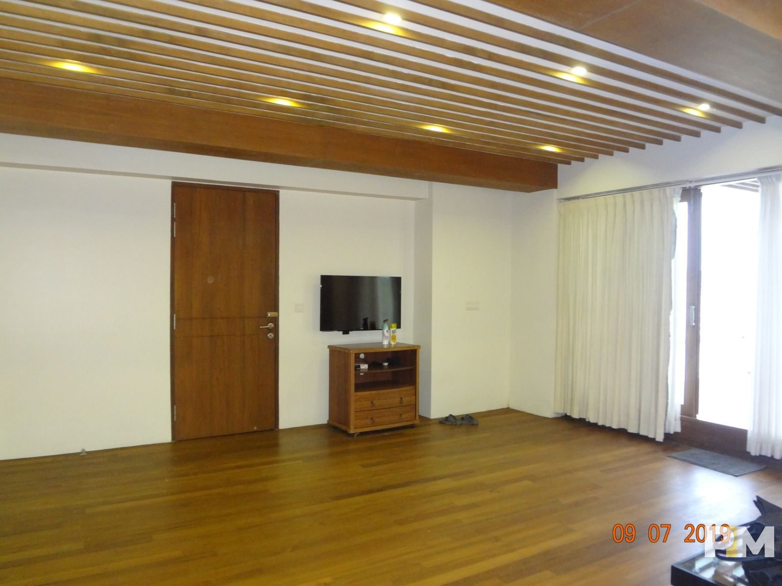 living room with TV - Myanmar Property