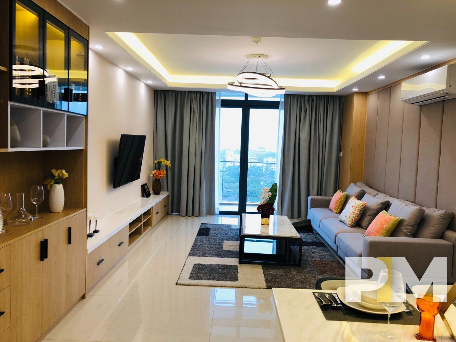 living room with TV - Myanmar Real Estate