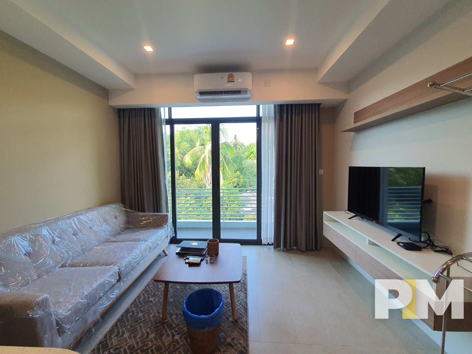 living room with TV - Rent in Myanmar