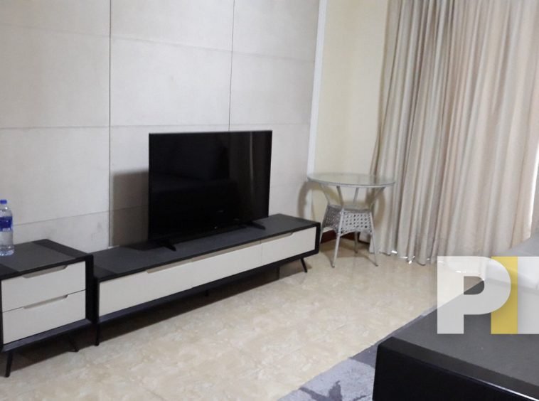 living room with TV - properties in Yangon