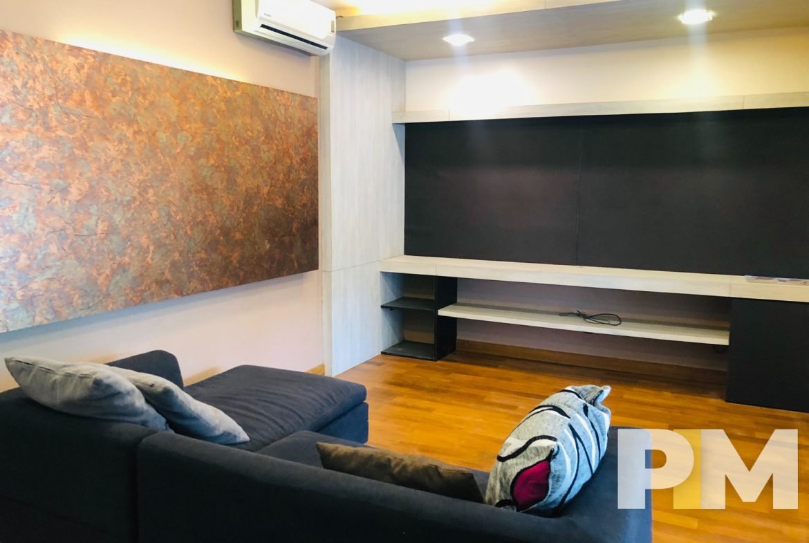 living room with air conditioner - Home Rental Myanmar