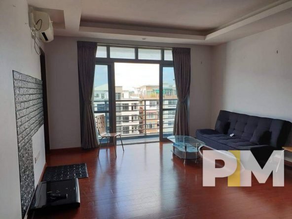 living room with balcony - properties in Yangon