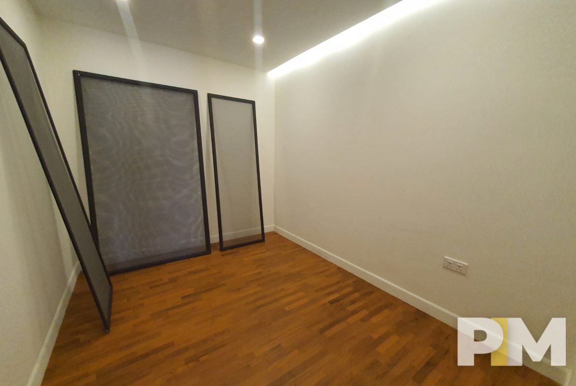 room with ceiling light - Serviced Apartments in Yangon