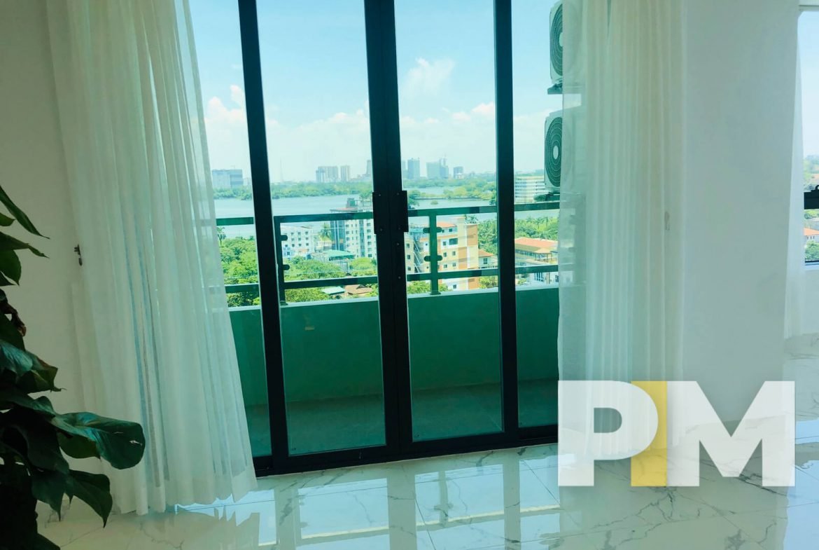balcony with large glass window - Real Estate in Yangon