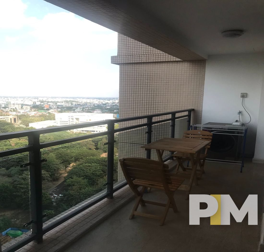balcony with table and chair - Yangon Real Estate