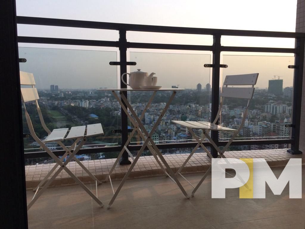balcony with table and seats - properties in Yangon