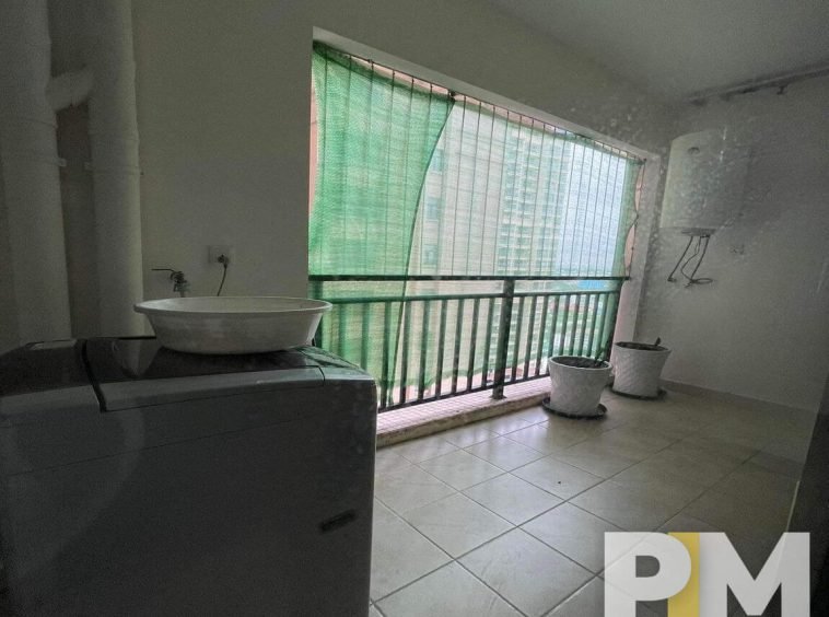 balcony with washing machine - property in Myanmar