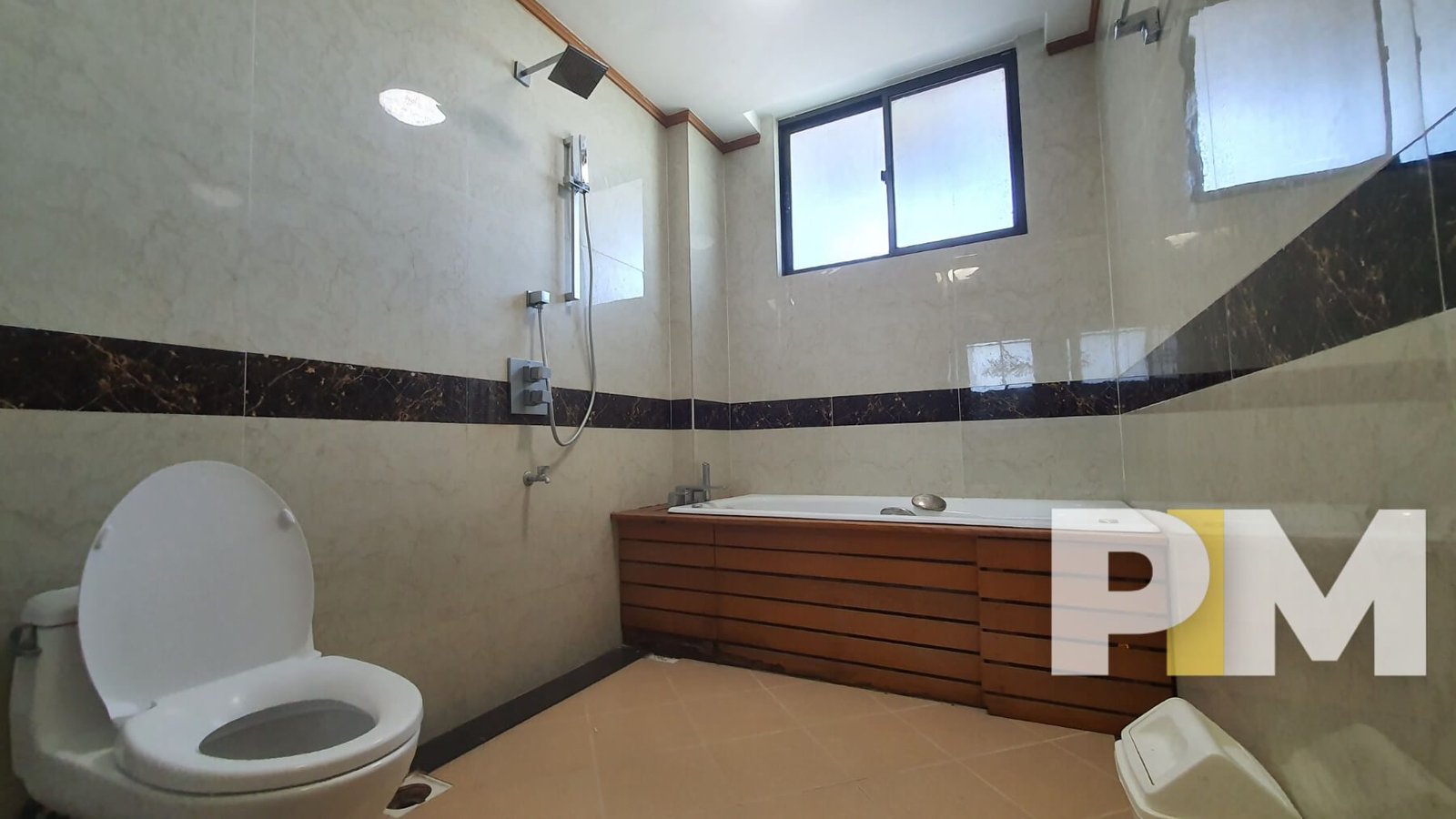 bathroom with bathtub - Condo for rent in Mayangone