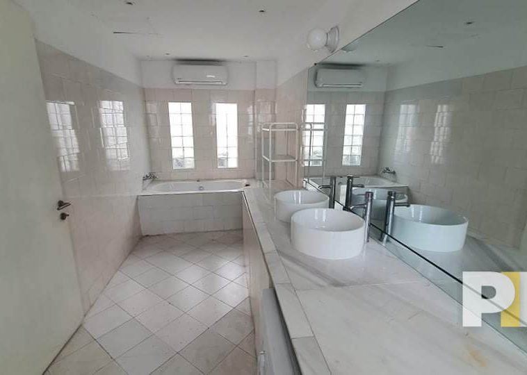 bathroom with mirror - Home Rental Yangon