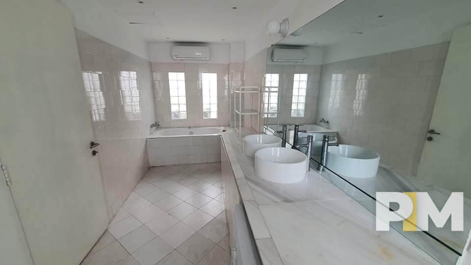 bathroom with mirror - Home Rental Yangon