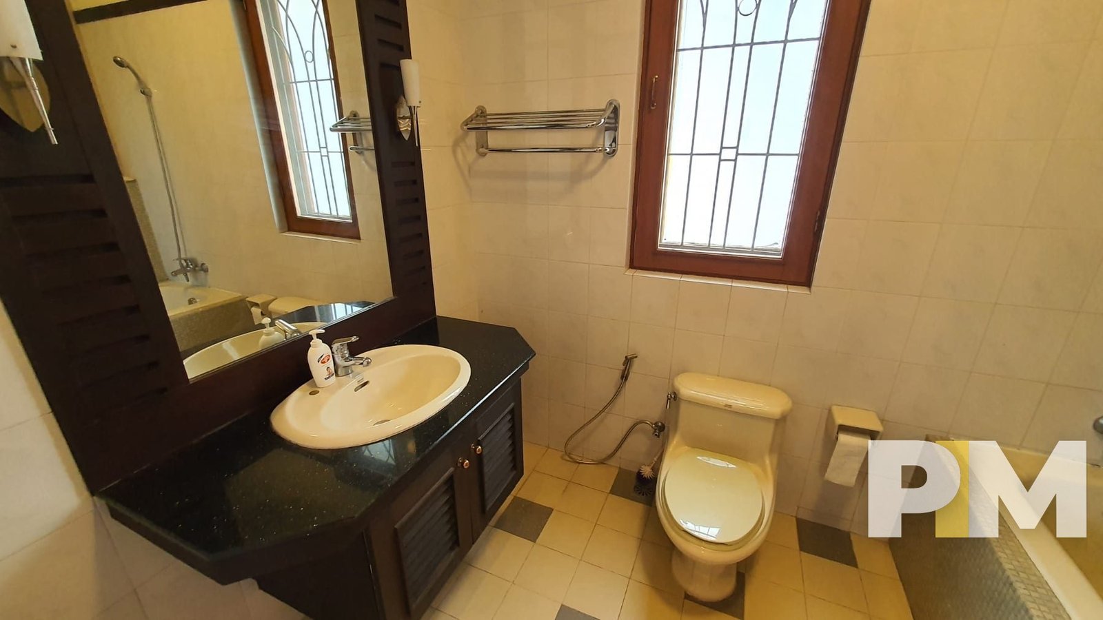 bathroom with mirror - Yangon Property