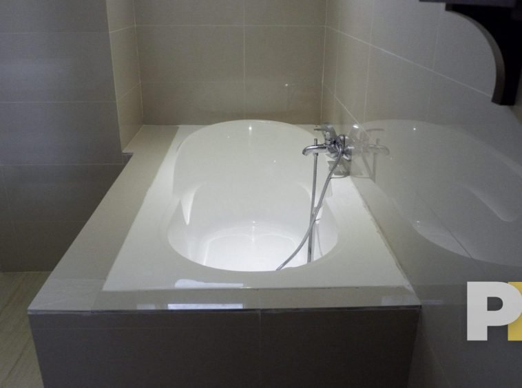 bathroom with sink - Yanogn Real Estate