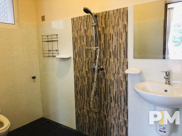 bathroom with tub - property in Yangon