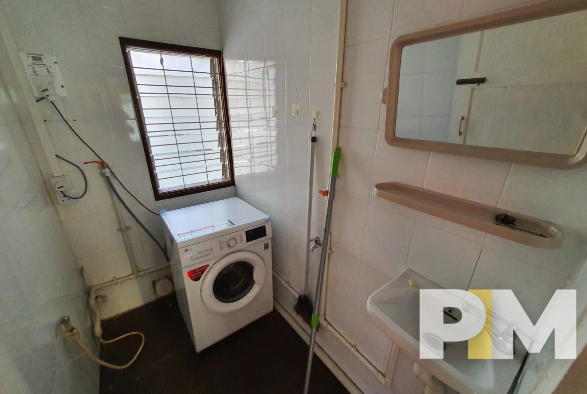 bathroom with washing machine - Home Rental Yangon