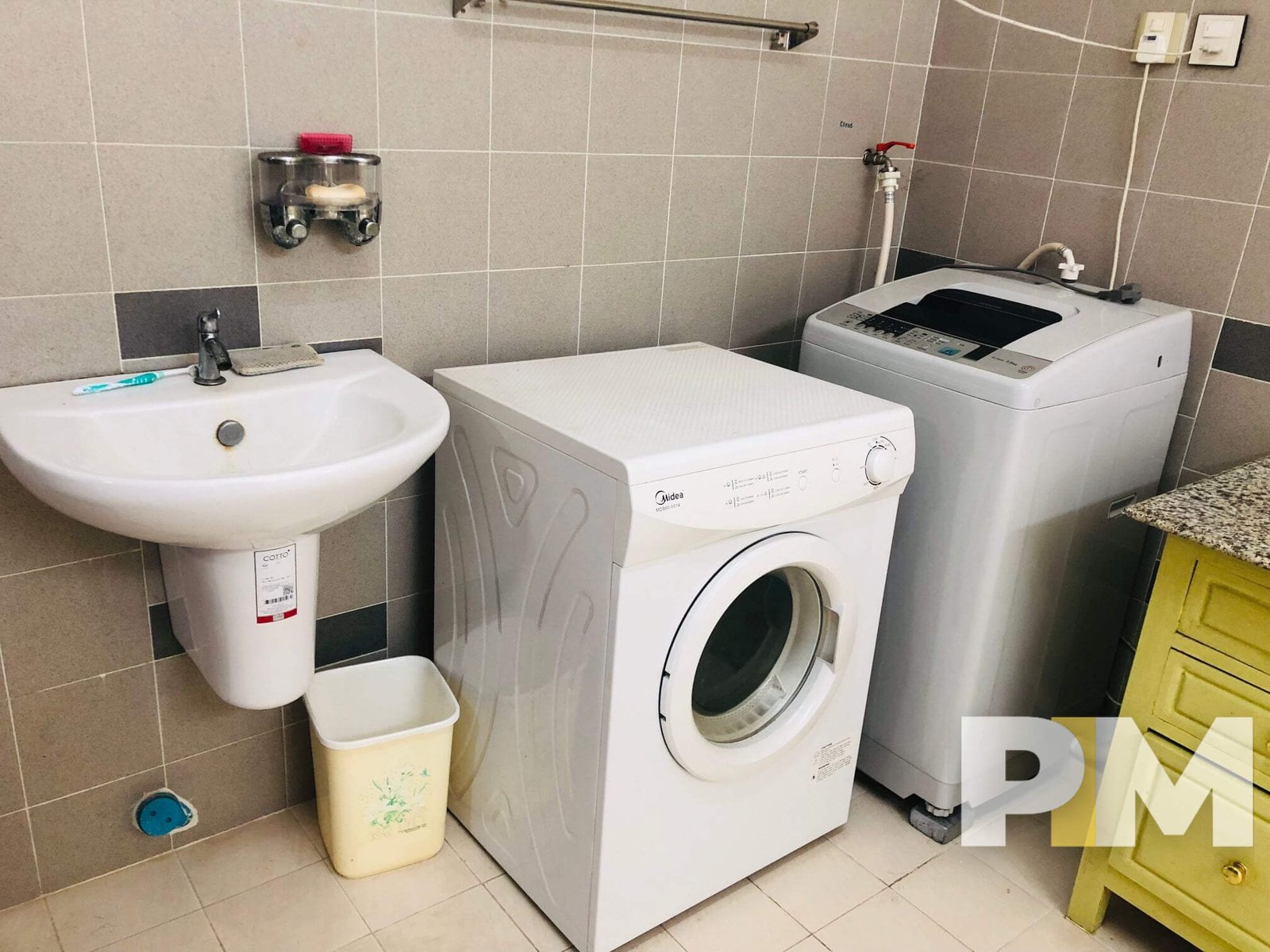 bathroom with washing machine - properties in Yangon