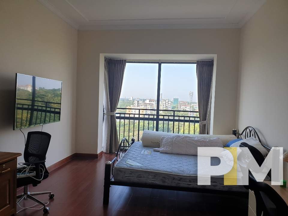 bedroom with TV - Real Estate in Yangon