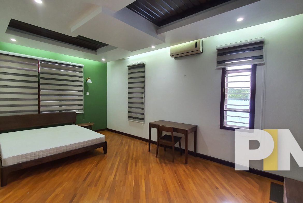 bedroom with air conditioner - Home Rental Yangon