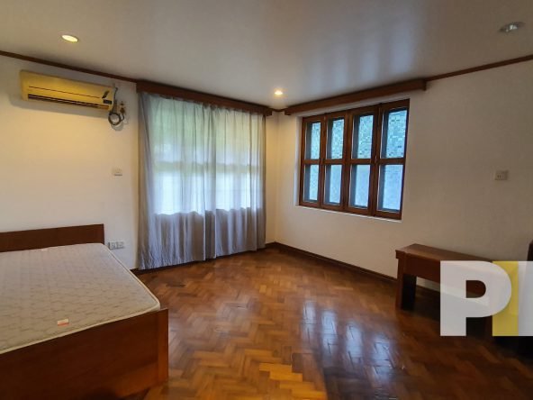 bedroom with air conditioner - Yangon Property