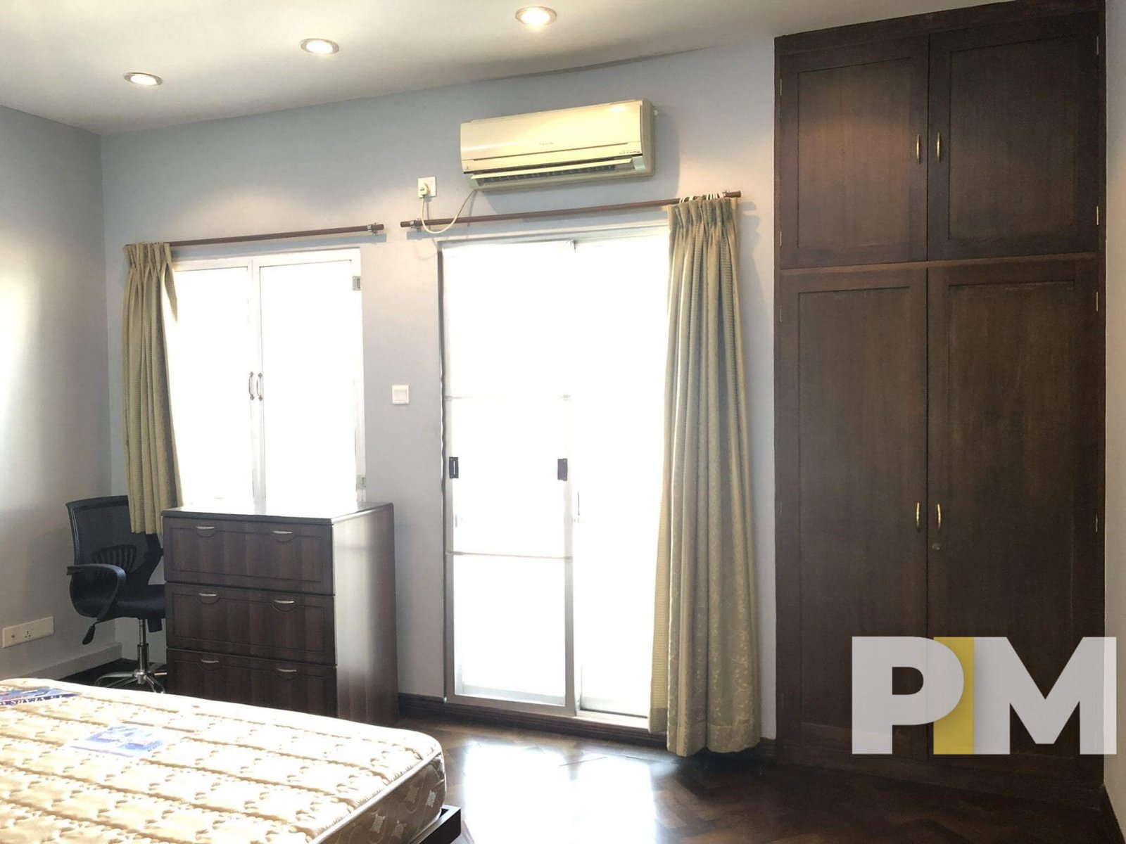 bedroom with air conditioner - Yangon Property