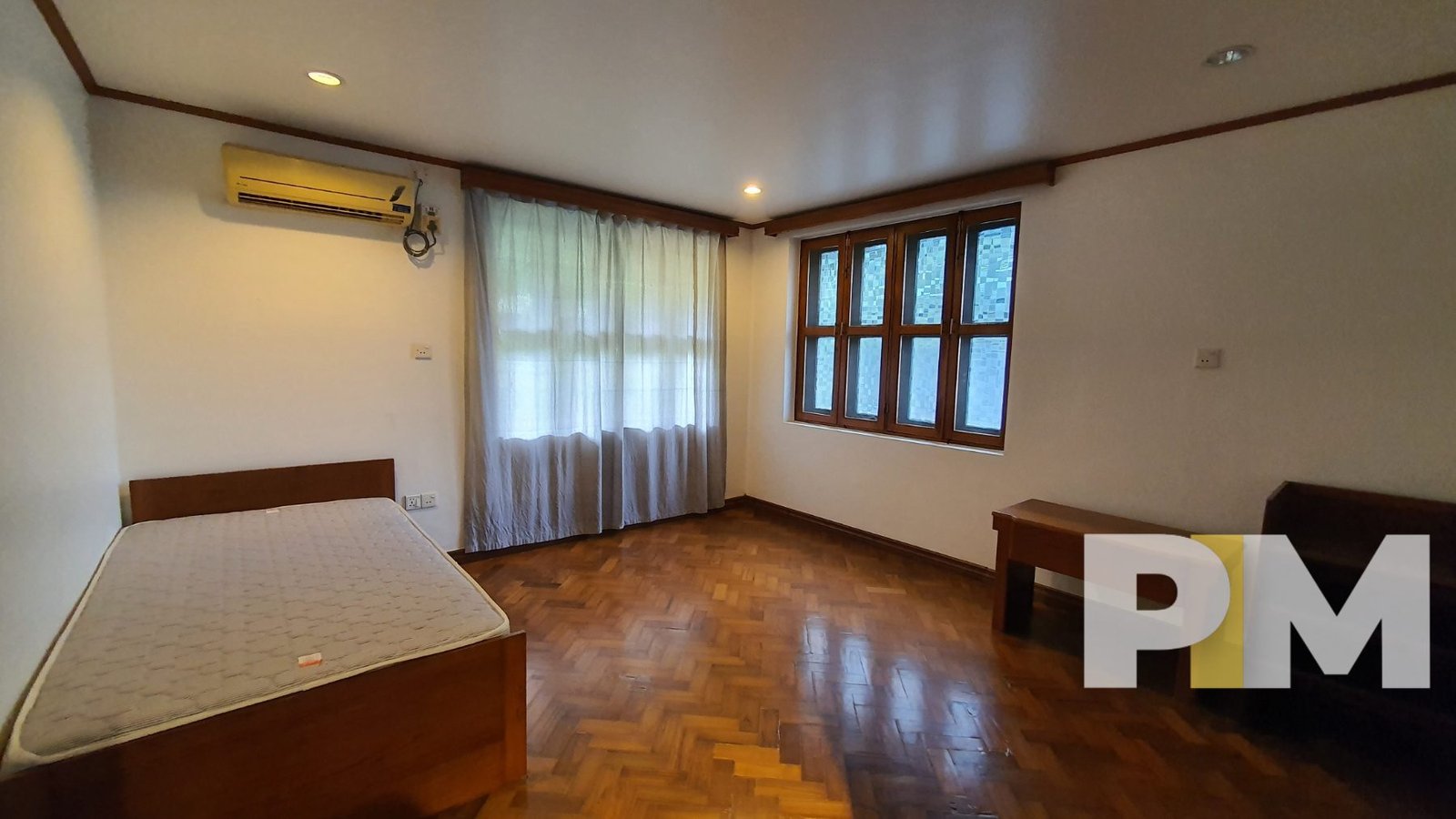 bedroom with air conditioner - Yangon Property