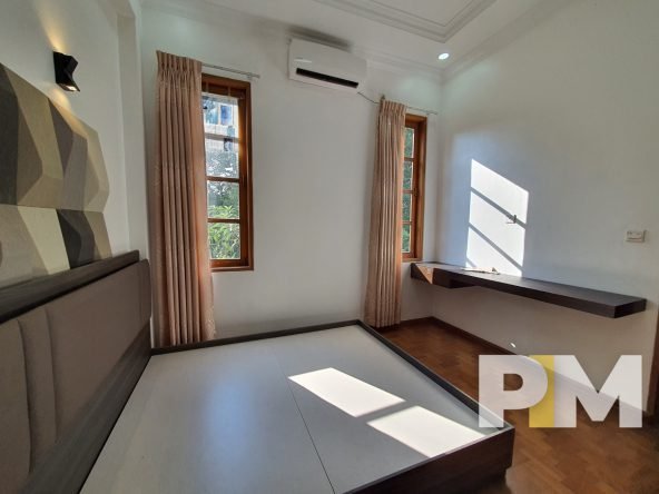 bedroom with air conditioner - Yangon Real Estate
