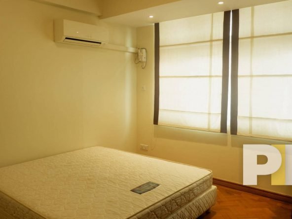 bedroom with air conditioner - Yangon Real Estate