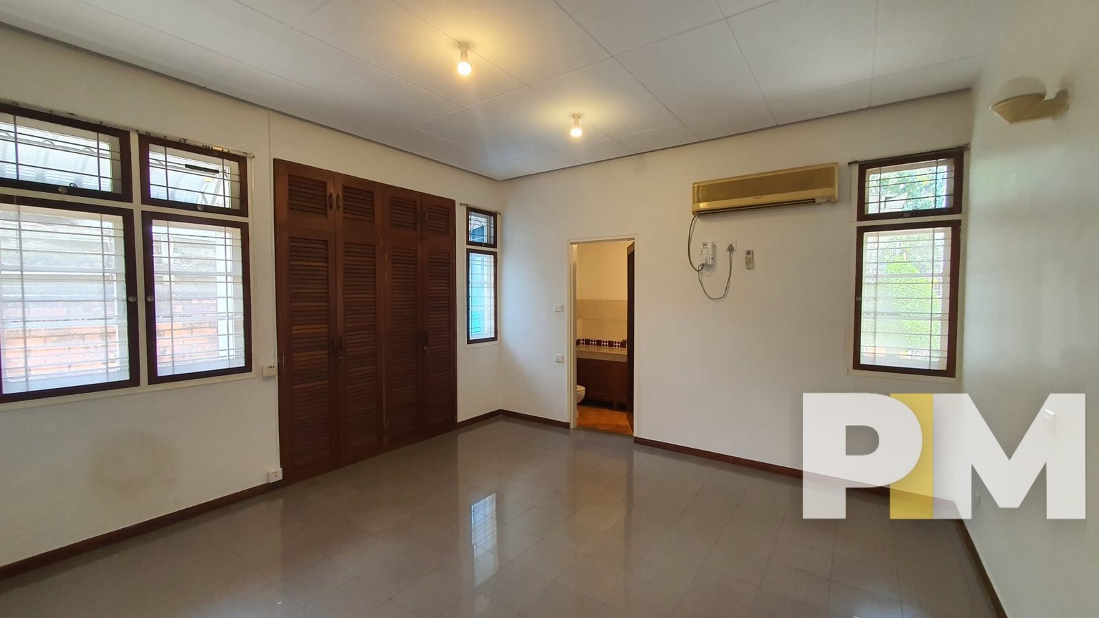 bedroom with air conditioner - Yangon Real Estate