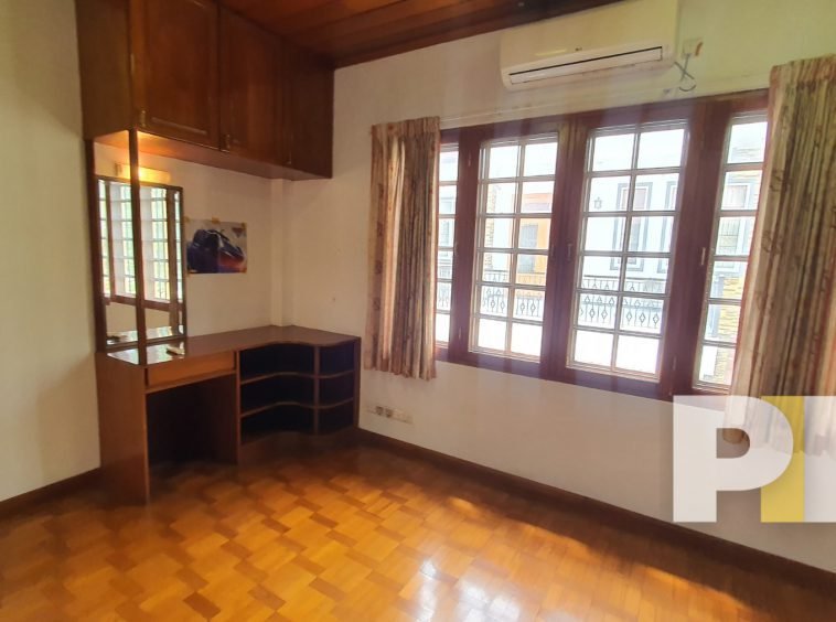 bedroom with air conditioner - properties in Myanmar