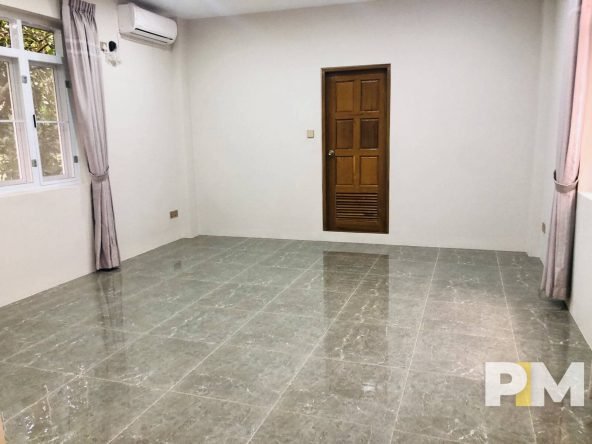 bedroom with air conditioning - Myanmar Real Estate