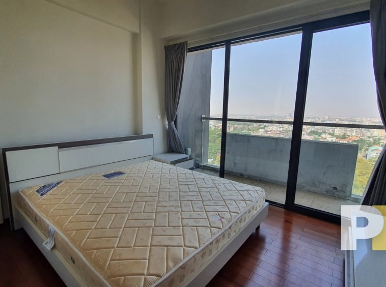 bedroom with balcony - Yangon Property