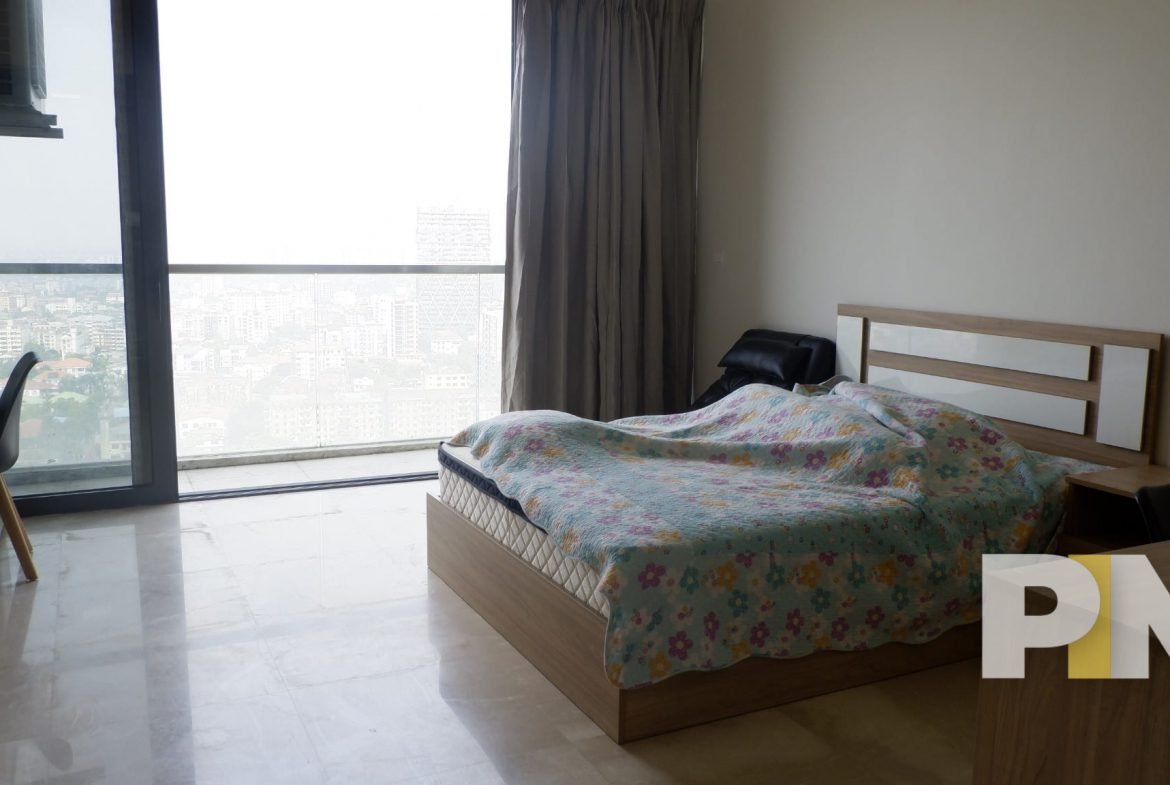 bedroom with balcony - Yangon Real Estate