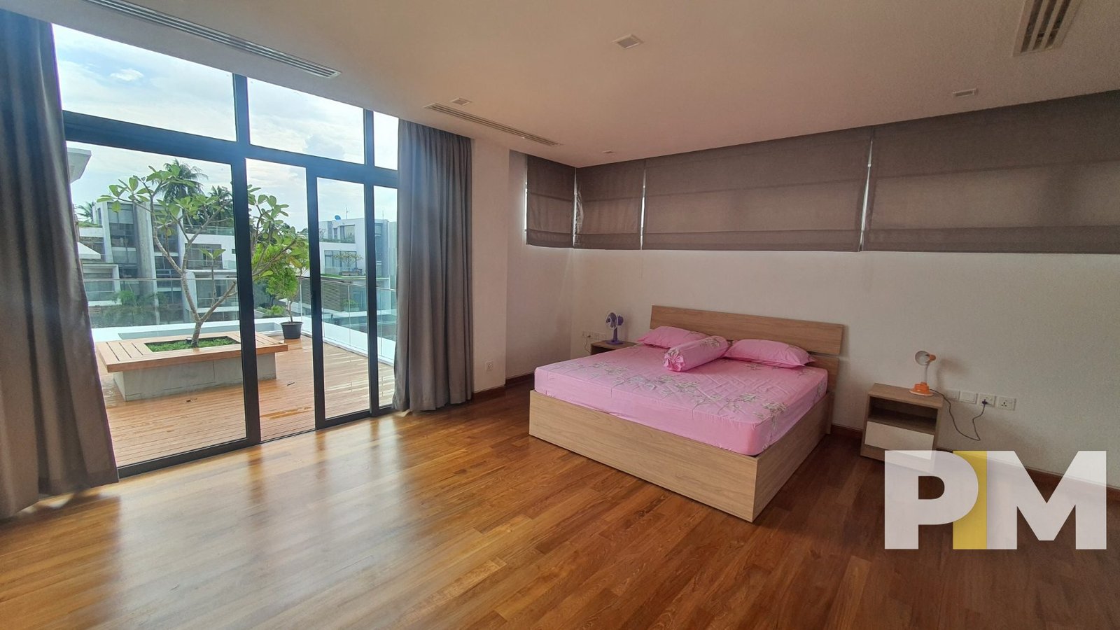 bedroom with balcony - properties in Yangon