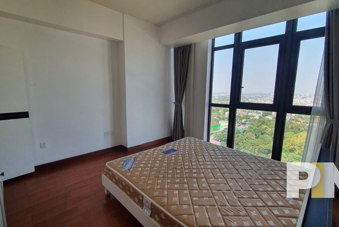bedroom with balcony - properties in Yangon