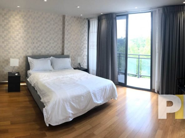 bedroom with balcony - properties in Yangon