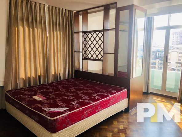 bedroom with balcony - properties in Yangon
